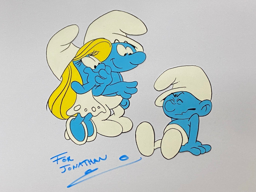 The Smurfs - Original animation cel of Smurfette, Grouchy and another Smurf (Used for publicity, signed by animator)
