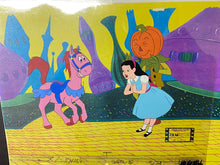 Load image into Gallery viewer, Journey Back to Oz (1972) - Original animation cel with drawings and copy background