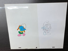 Load image into Gallery viewer, The Smurfs - Original animation cel and drawing of Sassette
